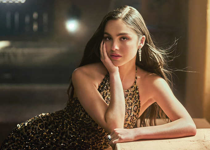 Olivia Rodrigo in a sequined leopard print dress