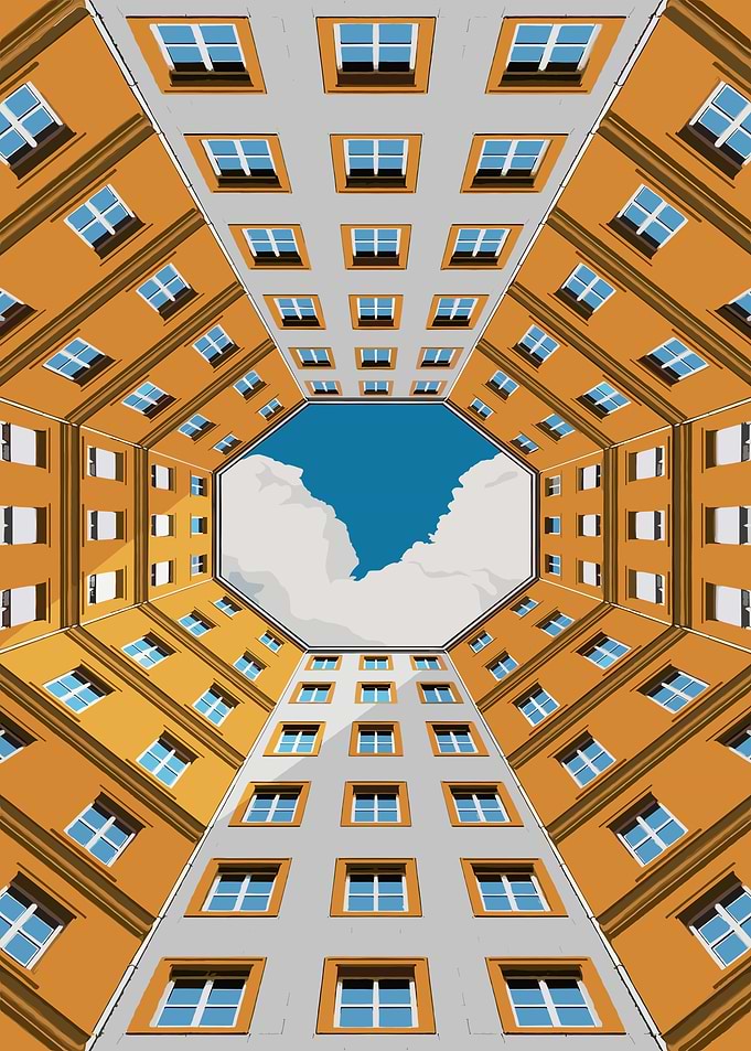 Looking up at buildings from a courtyard
