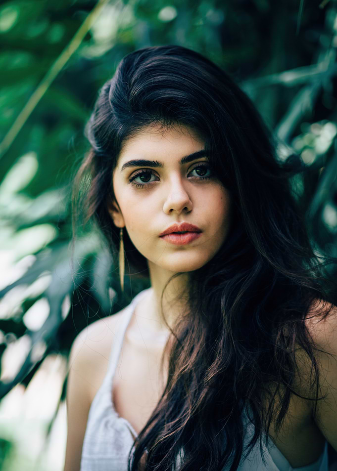 sanjana sanghi with dark hair in nature