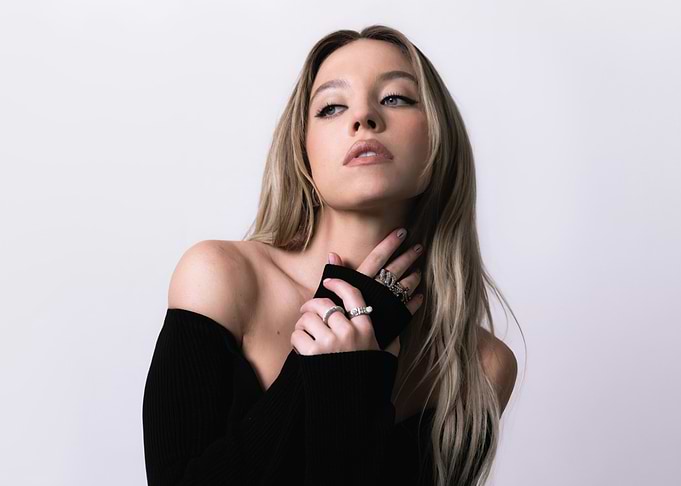 Sydney Sweeney Poses in Black Top