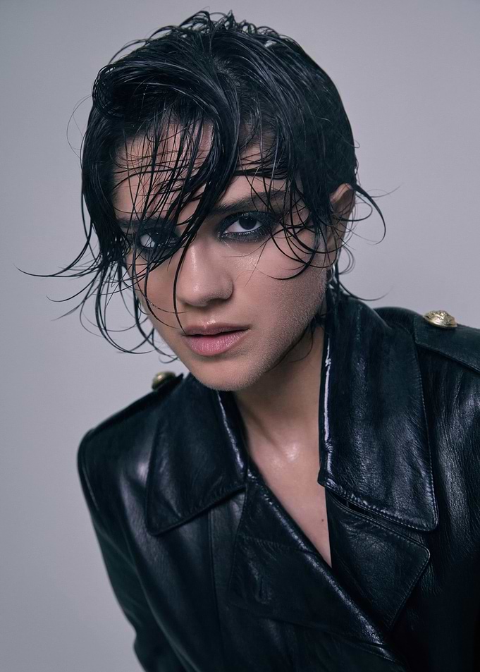 sasha calle in black leather jacket with wet hair