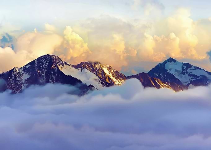 Majestic Mountain Peaks Above Clouds