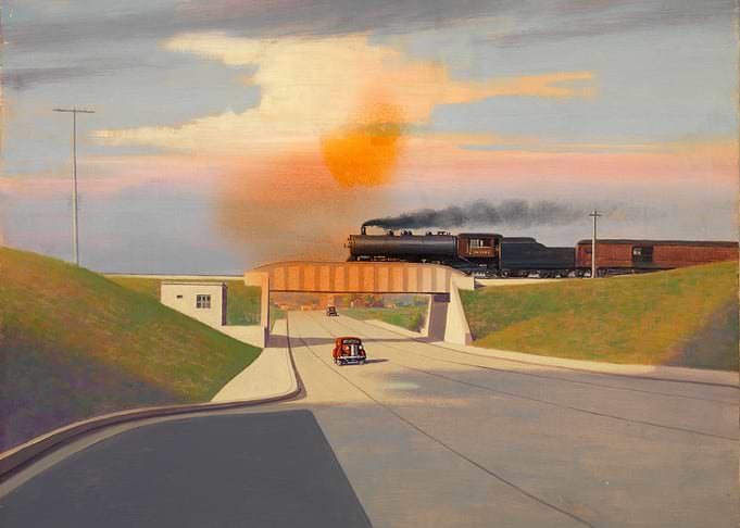 Train Crossing Overpass at Sunset