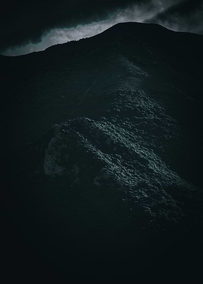 Dark Mountain Landscape with Clouds