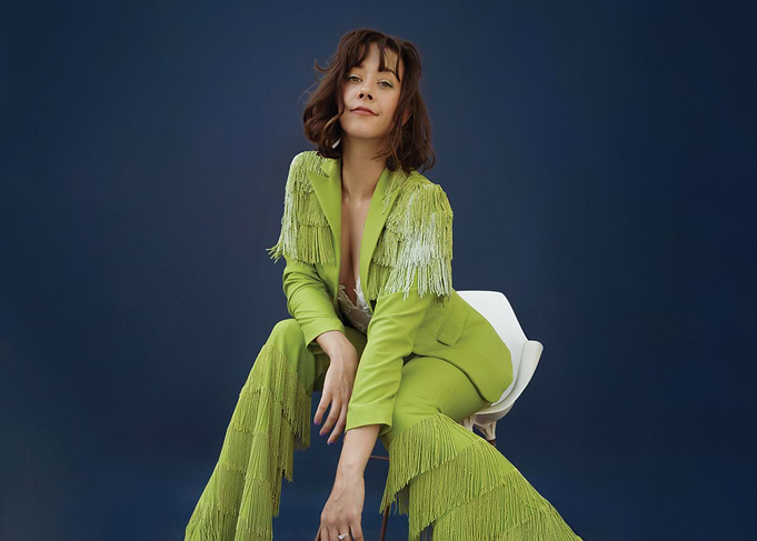 malia baker in lime green fringe suit
