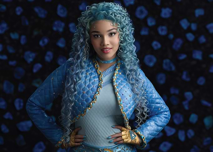 Blue-Haired Woman in Quilted malia baker Jacket