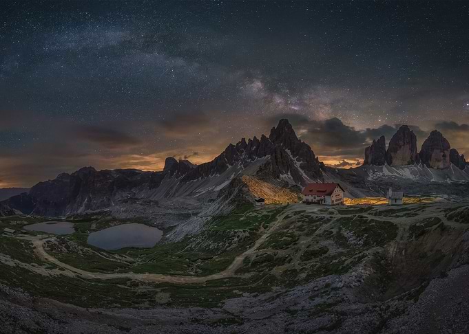 Mountain hut under the Milky Way