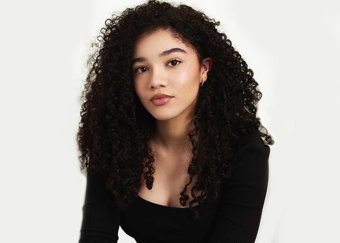 malia baker with Curly Hair