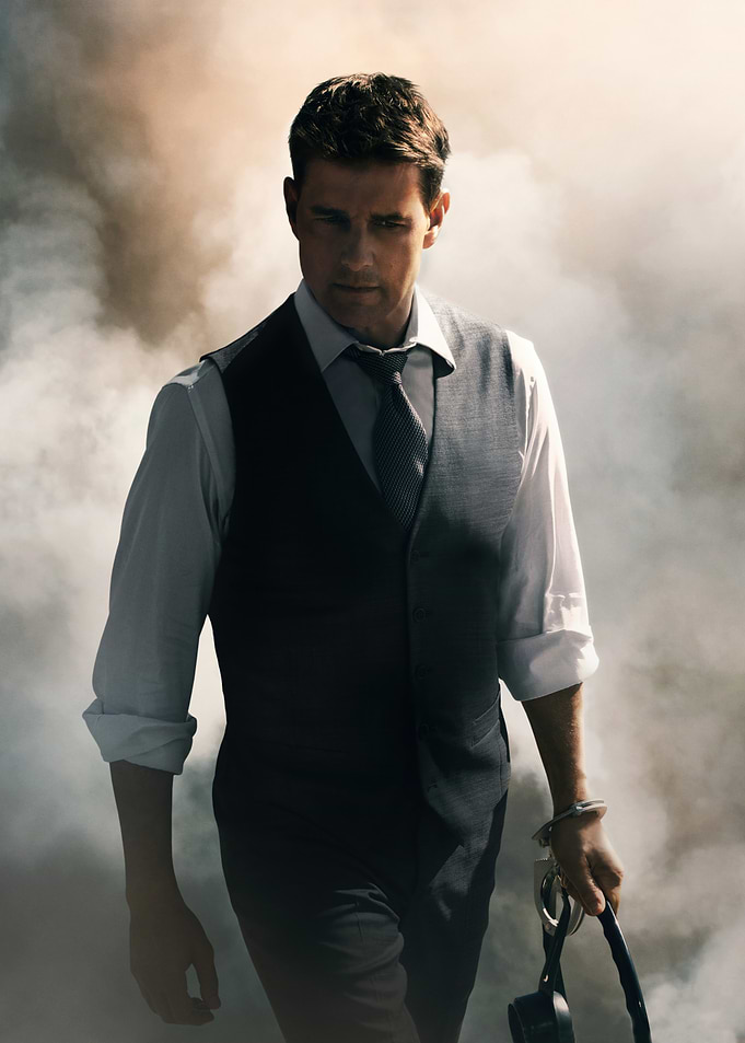 tom cruise in Suit Holding Handcuffs