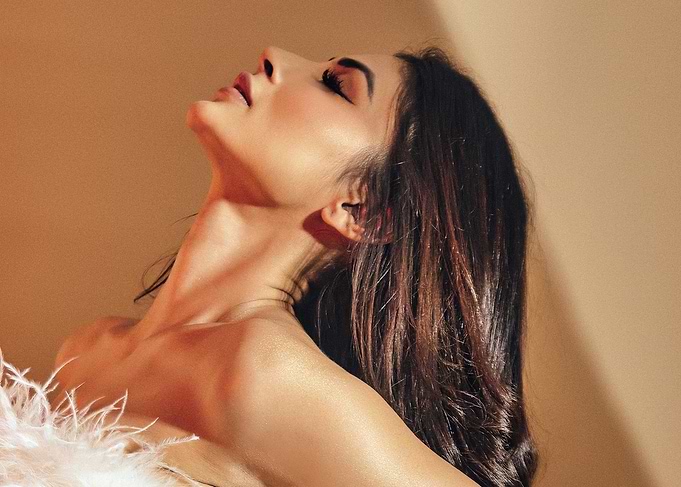 Glamorous Mouni Roy with Feather Boa