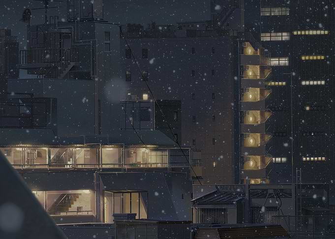 Snowy Cityscape at Night