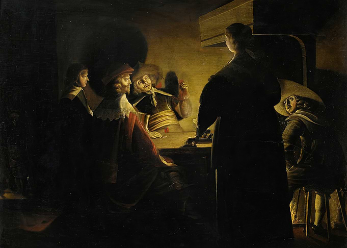 Men gathered around a table in dim light