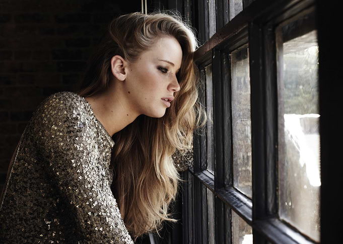 Jennifer Lawrence looking out a window