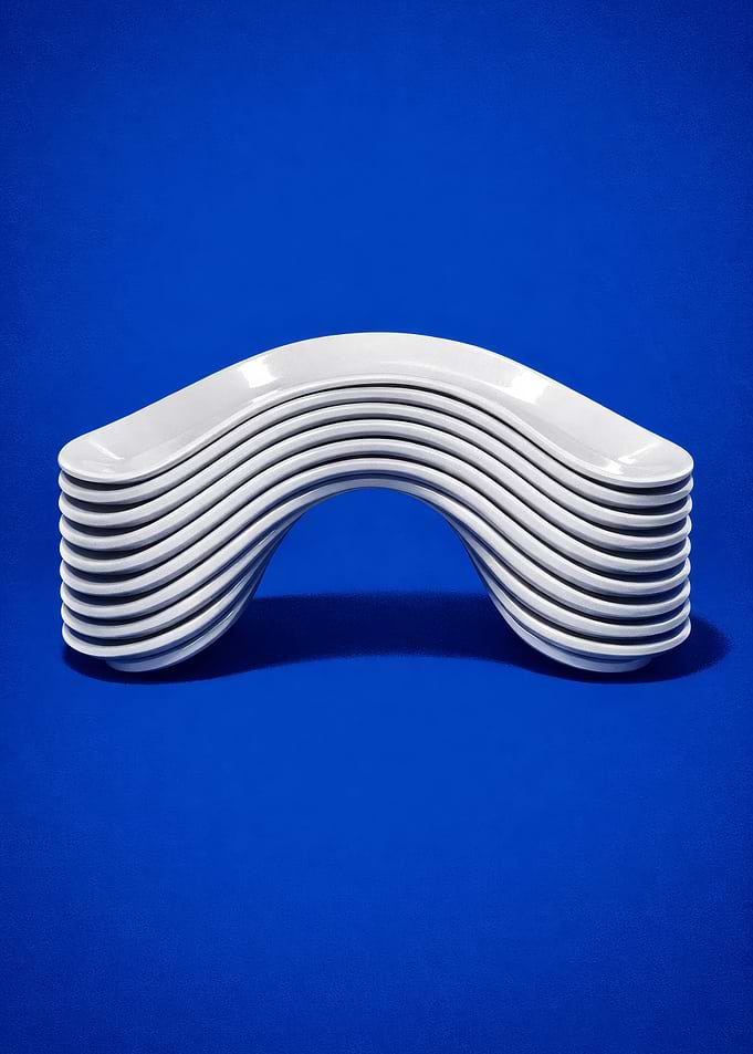 Stack of White Curved Plates