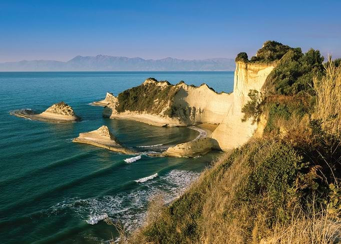 Dramatic coastal cliffs and turquoise sea