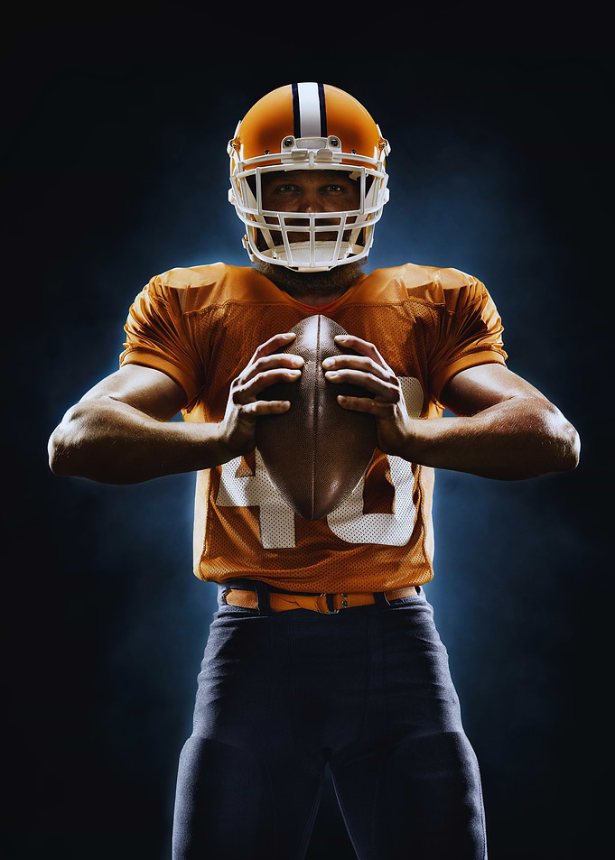 American Football Player with Ball