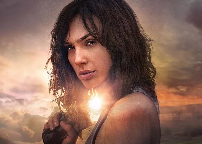 Gal Gadot as a warrior with a gun