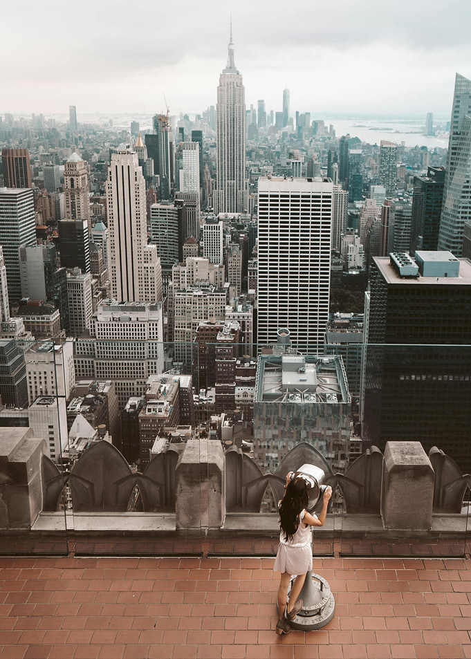 Woman looking at New York City skyline