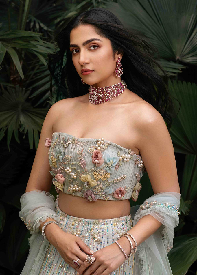rukmini vasanth in traditional Indian attire with jewelry
