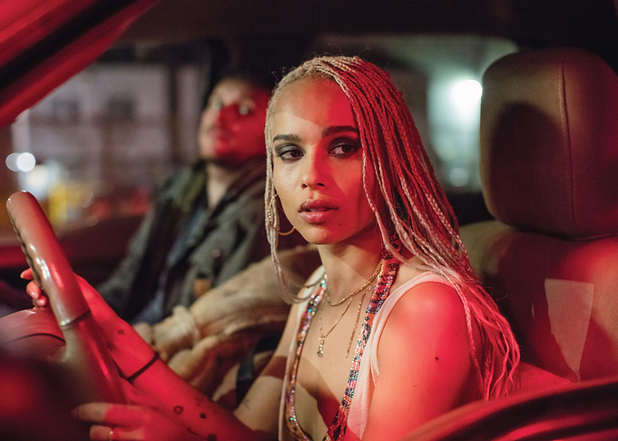 Zoë Kravitz driving a car at night