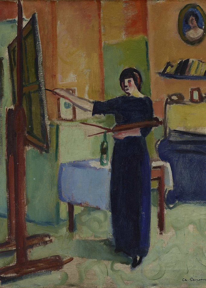 Artist painting in a studio