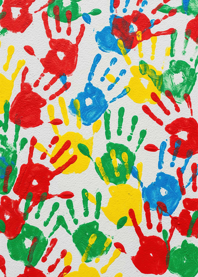 Colorful Handprints on White Canvas
