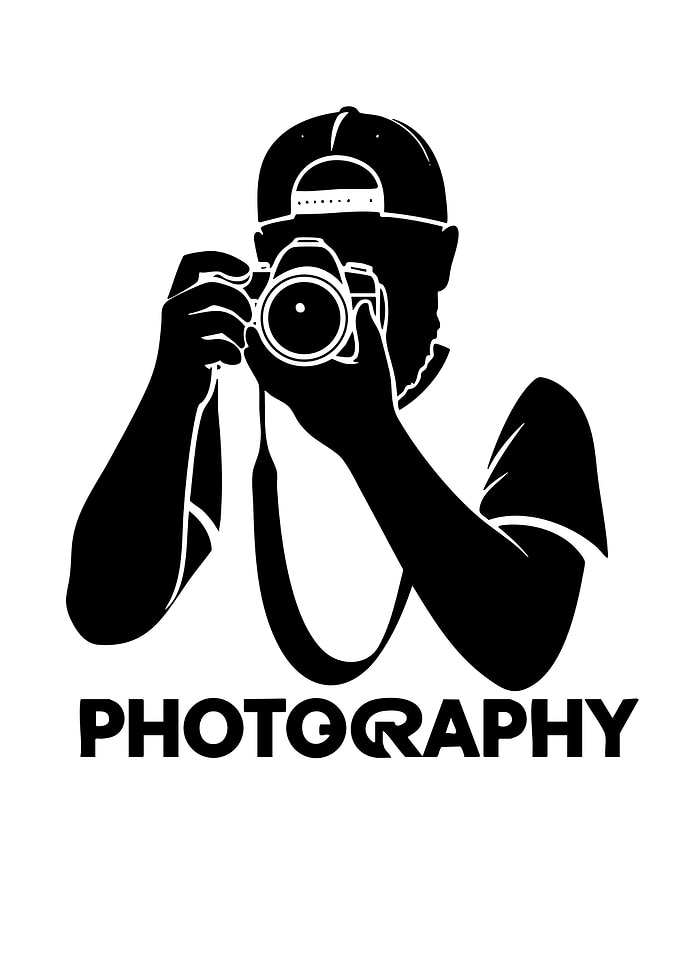 Silhouette of a photographer with camera
