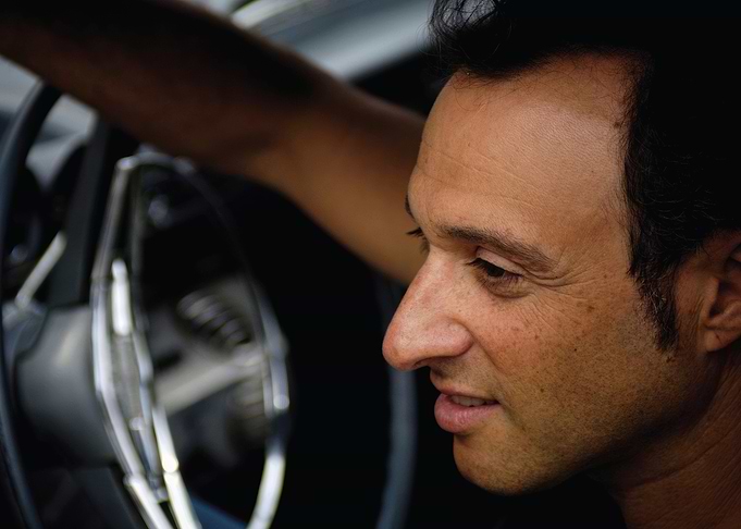 dan bern driving a car