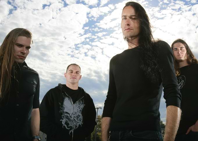 arsis sky Four men in black clothing against sky