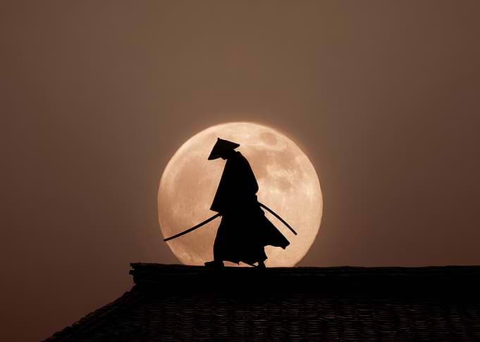 Samurai Silhouette Against Full Moon