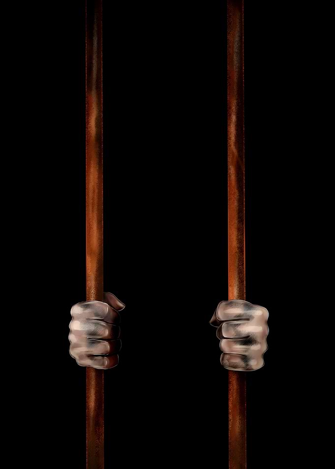 Hands gripping prison bars