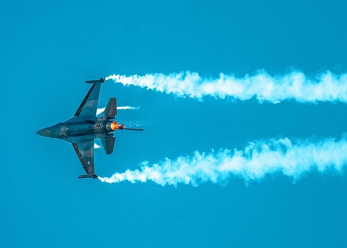 Fighter Jet Performing Aerial Maneuver