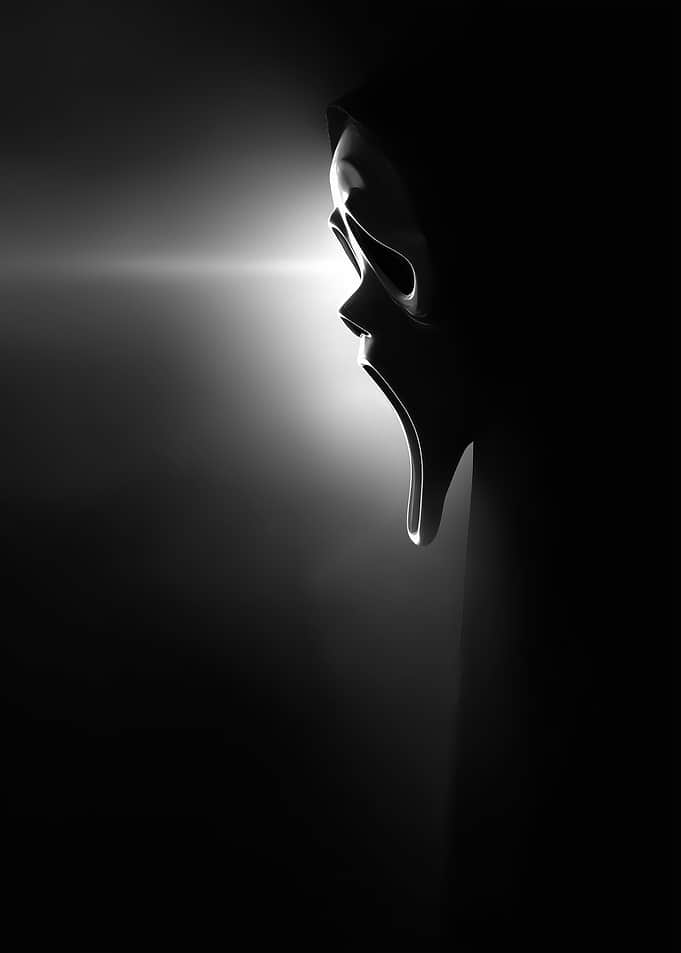 Ghostface Mask in Dramatic Lighting