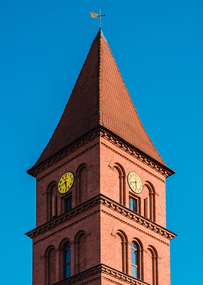 Brick Clock Tower Against Blue Sky Poland