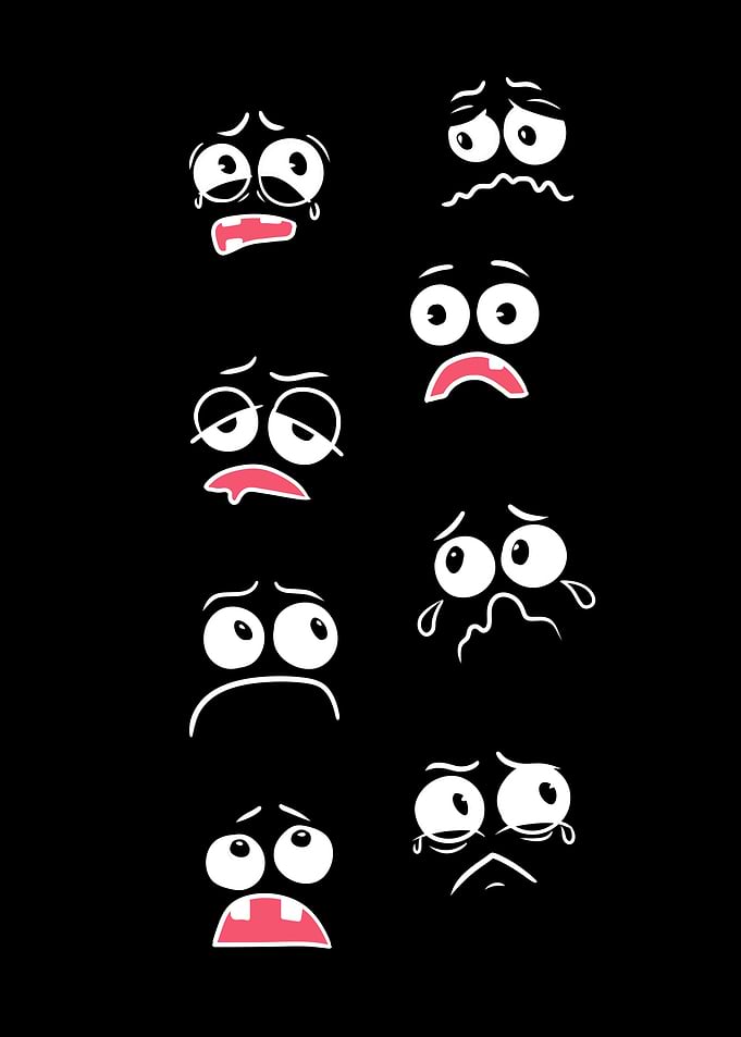 Collection of Cartoon Faces Expressing Sadness and Fear