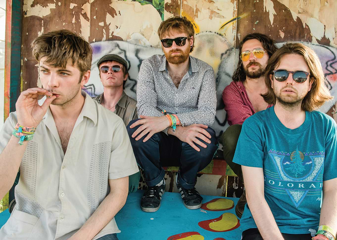 Band Posing in Front of Graffiti Wall fontaines dc