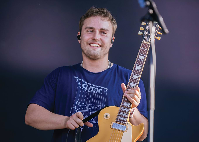 Musician with Guitar on Stage Sam Fender