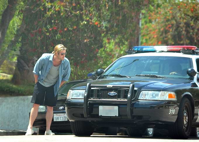 Man near police car