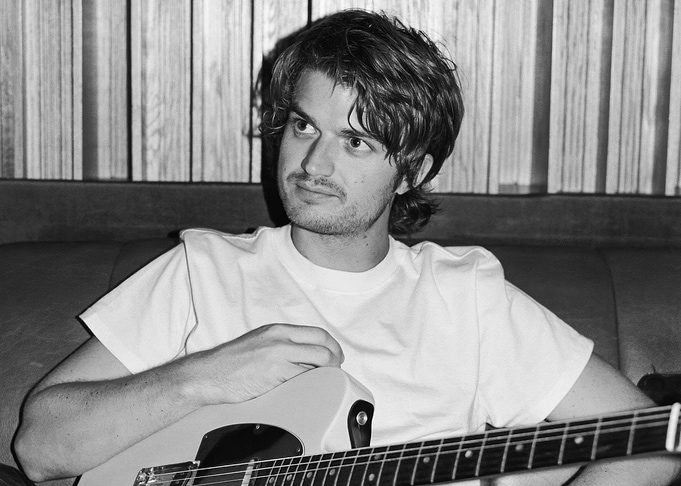 djo joe keery with Guitar in Studio