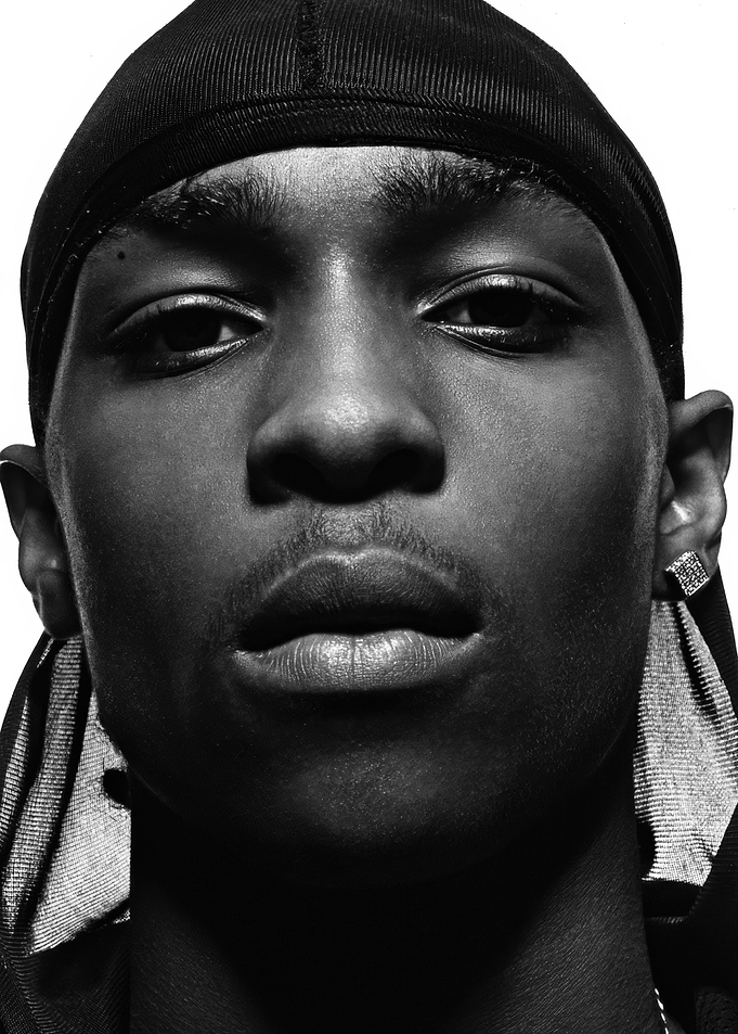 Close-up of a man wearing a durag jme