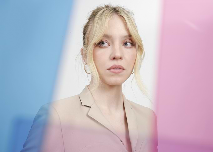 Sydney Sweeney in a beige suit