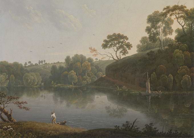 Man fishing by a serene lake