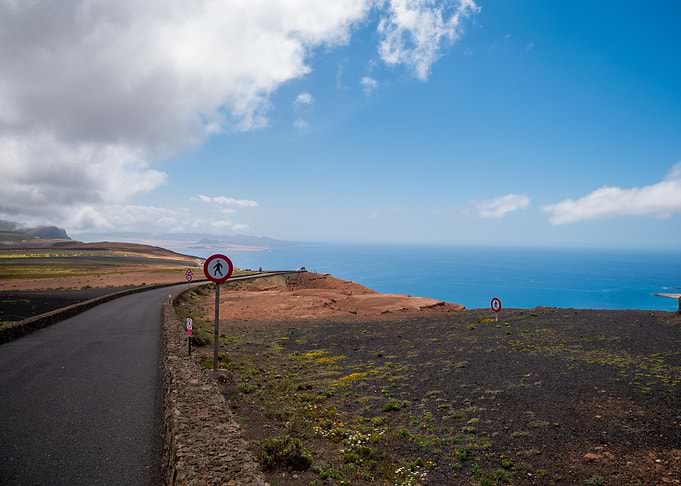 Coastal Road with Pedestrian Crossing Signs