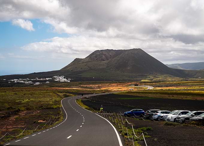 Volcanic Landscape with Road and Village