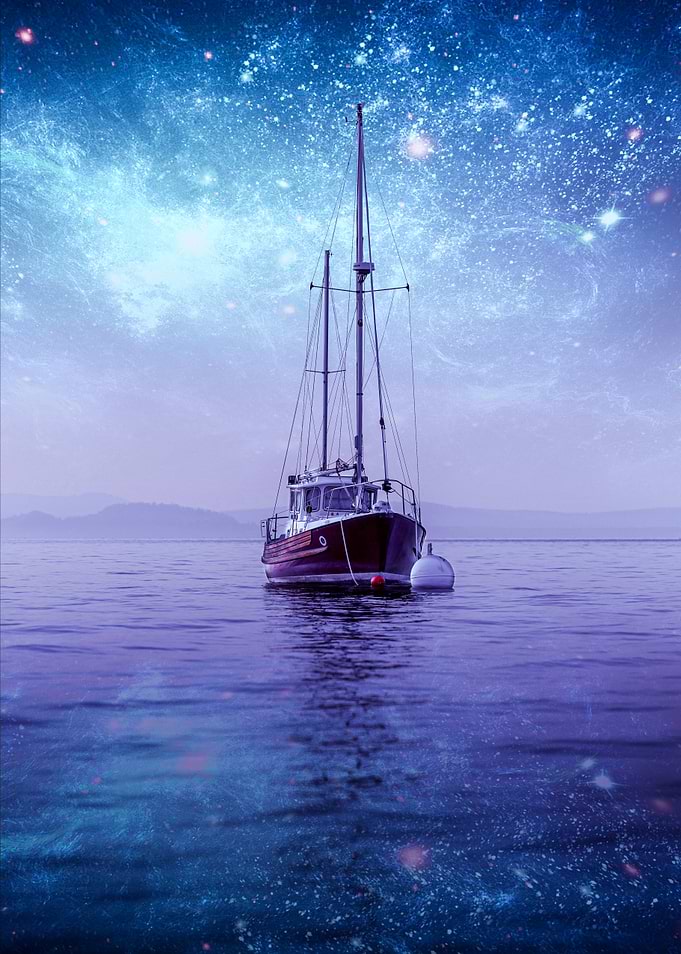 Sailboat under a starry sky