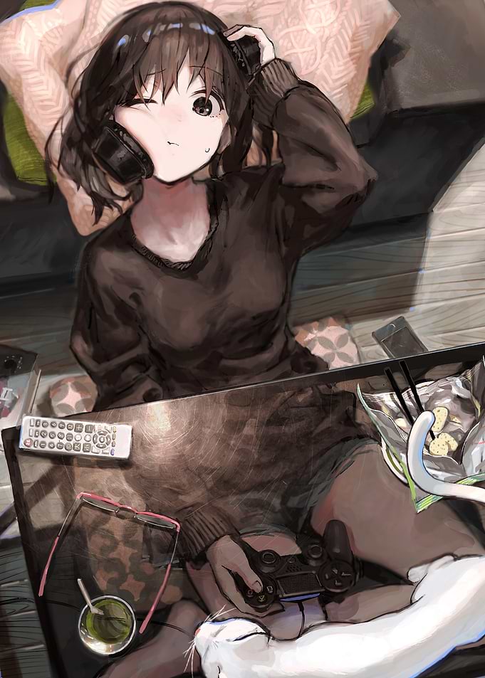 Girl playing video games with headphones