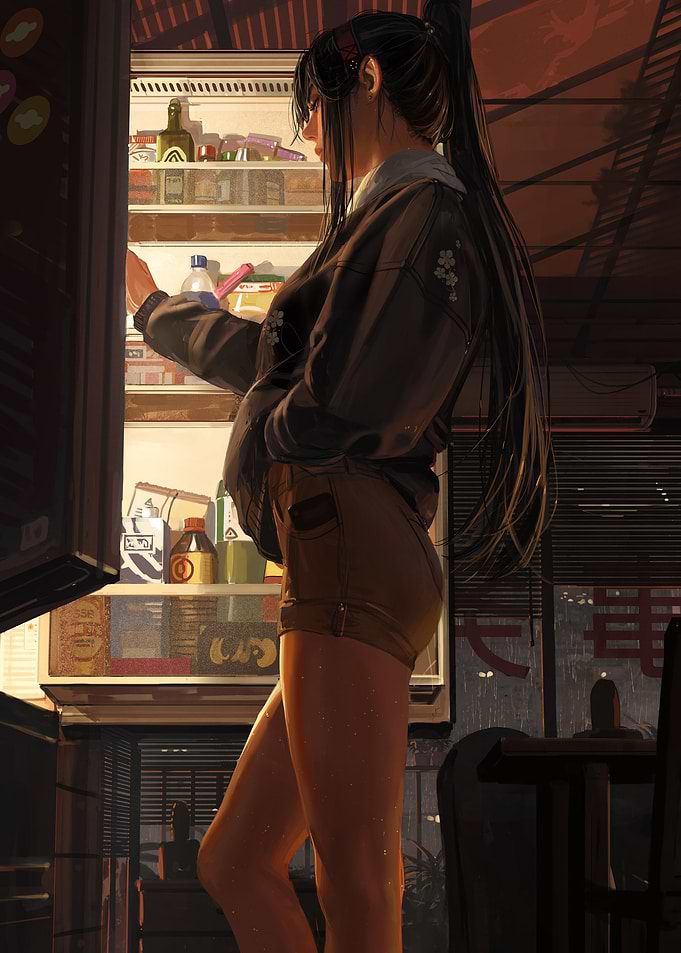 Woman looking into a refrigerator
