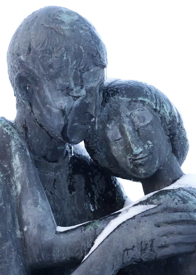 Bronze Sculpture of Embracing Couple in Snow