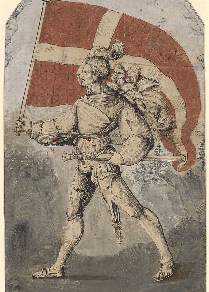 Man carrying a large flag