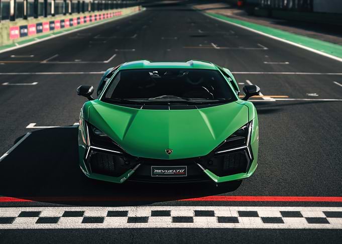 Green Supercar on Race Track Finish Line